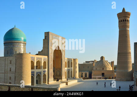 Mir-i-Arab Madrassah and Kalon minaret. Bukhara, a UNESCO World Heritage Site. Uzbekistan Stock Photo