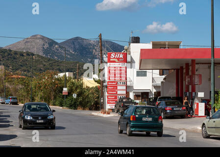 Neopolis, northern Crete, Greece. October 2019.  Peterol station on the Old National Road as driving into Neopolis a Cretan historic town. Stock Photo