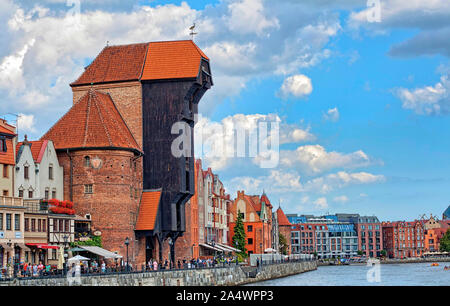 Historic fifteenth century harbour crane at once one of the gates of Gdansk Old Town, located at Long Riverside at River Motlawa. It is the biggest an Stock Photo