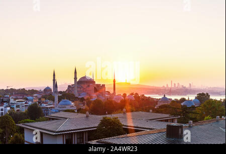 Hagia Sophia and Istanbul roofs at sunrise, beautiful view Stock Photo
