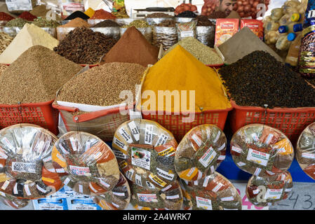 Dried fruits and spices. Chorsu Bazaar is the main bazaar located in the old town of Tashkent. Under its blue and green-colored dome and the adjacent Stock Photo