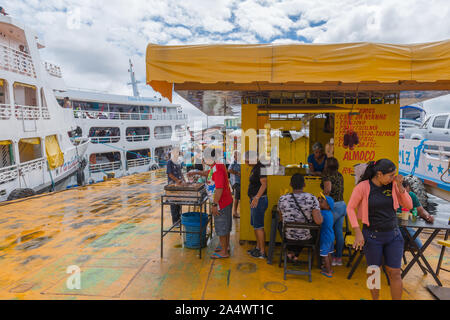 The busy Porto Flutante or floating habour, slow boats being loaded for their Amazon tour, Manaus, The Amazon, Brazil, Latin America Stock Photo