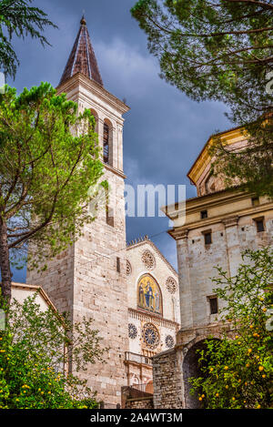 View of the wonderful Spoleto Cathedral facade and bell tower completed in the 13th century, from Piazza della Signoria Square Stock Photo