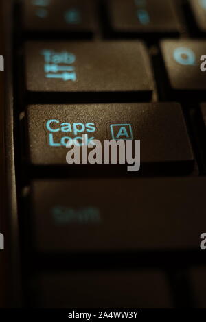 Black keyboard closeup. Focus on Caps Lock Stock Photo