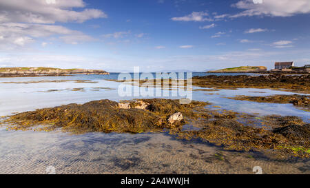 Rhoscolyn beach at low tide, Anglesey, North Wales on a sunny day Stock Photo
