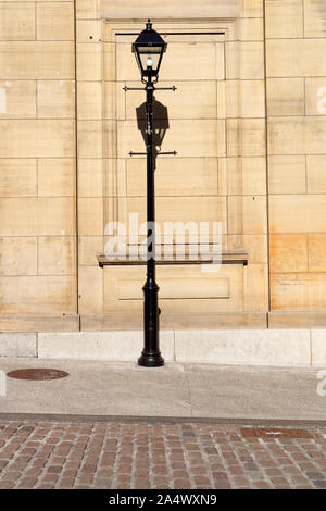 Decorative black metal streetlight lantern in Old Montreal, Quebec, Canada Stock Photo