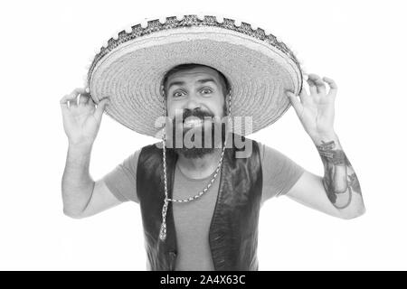 Real macho. Bearded macho wearing sombrero. Mexican macho in south american style. Spanish macho with beard and moustache in traditional mexican costume. Stock Photo