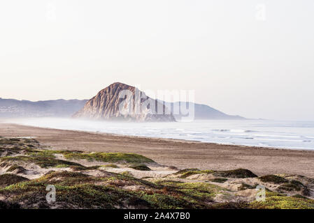 Morro Rock from Morro Strand State Beach. Morro Bay, CA. Stock Photo