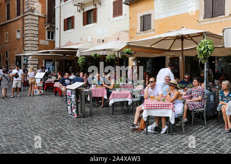 Tourists having a drink at outdoor cafe bar restaurant in the Piazza della Rotonda in Rome, Italy Stock Photo