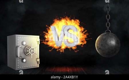 3d rendering of a retro iron safe box and a black wrecking ball with large exploding letters VS between them. Stock Photo