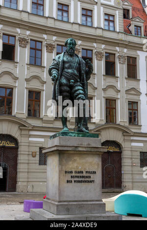 Statue of Hans Jakob Fugger (or Johann Jakob Fugger) in Fuggerplatz, Augsburg, Bavaria, Germany. Stock Photo