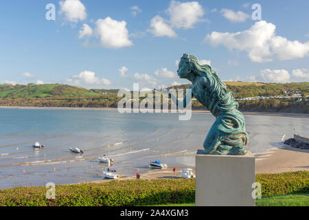 16/10/2019 New Quay, West Wales. This lovely statue stands at the exact half way point of the Wales Coastal path. Stock Photo