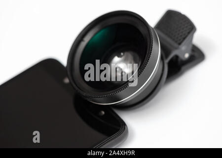 Macro lens before attaching to a smartphone. Stock Photo