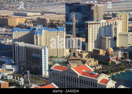 Famous Welcome to Fabulous Las Vegas sign superimposed over view of  southern end of Las Vegas at dawn Stock Photo - Alamy