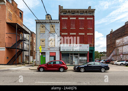 Cincinnati, OH – Circa JULY 2013 – Buildings in the rapidly gentrifying  Over-the-Rhine district stand ready to be renovated. Stock Photo