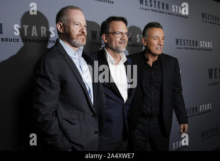 New York, United States. 16th Oct, 2019. Chairman of Warner Bros. Pictures Group Toby Emmerich, film editor Thom Zimny and Bruce Springsteen arrive on the red carpet at the New York special screening of 'Western Stars' at Metrograph in New York City on Wednesday, October 16, 2019. Photo by John Angelillo/UPI Credit: UPI/Alamy Live News Stock Photo