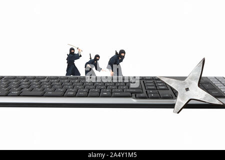 Keyboard and ninja Stock Photo