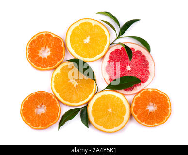 Citrus fruits isolated on white background. Isolated citrus fruits. Pieces of mandarin, pink grapefruit and orange isolated on white background, with Stock Photo