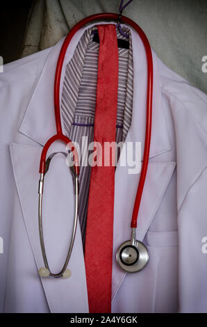 The old doctor coat hangs on Stock Photo