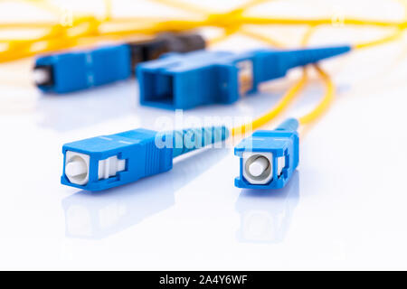 Fiber Optics connectors symbolic photo for fast internet connection ,Internet Service Provider equipment.broadband connection is  available everywhere Stock Photo