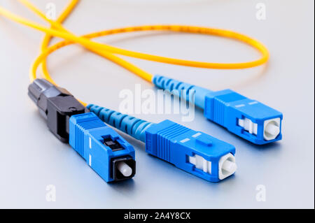 Fiber Optics connectors symbolic photo for fast internet connection ,Internet Service Provider equipment.broadband connection is  available everywhere Stock Photo