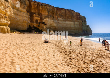 View of Praia de Benagil, a beautiful sandy beach on Algarve coastline. Carvoeiro, Portugal, April 2019 Stock Photo