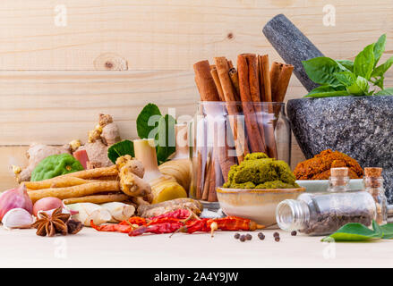 Assortment of Thai food Cooking ingredients and Paste of thai popular food red curry and green curry. Stock Photo