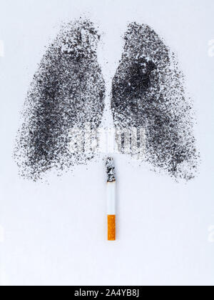 Shape of lungs with charcoal powder and cigarette on white background Stock Photo