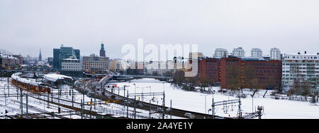 STOCKHOLM, SWEDEN - FEBRUARY 02, 2019: Winter panorama of the capital's railway station and one of the ducts of Lake Malaren. Gloomy cold day landscap Stock Photo