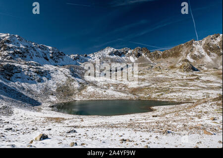 Macun Lakes in autumn with the first snow Stock Photo