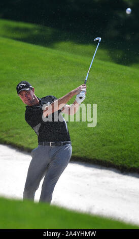 Sanya, China's Hainan Province. 17th Oct, 2019. Ben Stow of England hits during the first round match at the European Challenge Golf Tour 2019 Hainan Open in Sanya, south China's Hainan Province, on Oct. 17, 2019. Credit: Guo Cheng/Xinhua/Alamy Live News Stock Photo