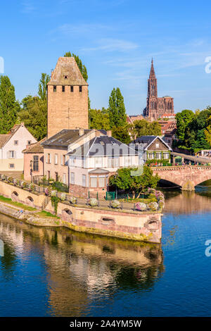 Close-up on the Ponts Couverts on the river Ill in the Petite France historic quarter in Strasbourg, France, with the cathedral in the distance. Stock Photo