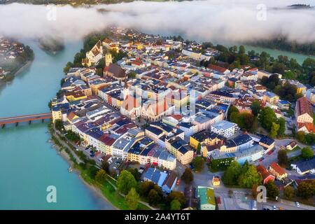 Old town in river loop of the Inn at sunrise, moated castle am Inn, aerial view, Upper Bavaria, Bavaria, Germany Stock Photo