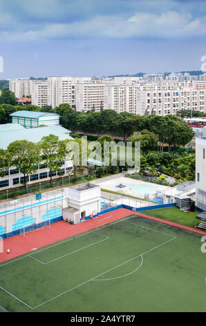 Singapore-26 NOV 2017:Singapore public football field in housing area Stock Photo