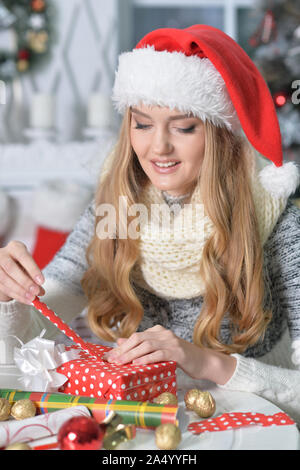 Close up portrait of young woman preparing for Christmas Stock Photo