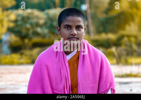 Portrait of a young Buddhist Monk in Lumbini, Nepal Stock Photo