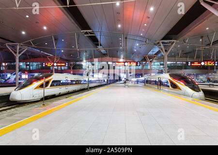 Tianjin, China – September 29, 2019: Fuxing high-speed trains at Tianjin railway station in China. Stock Photo