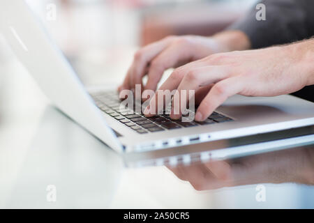 Work on a laptop - as always, the programmer pretends to work Stock Photo
