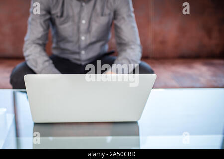 Work on a laptop - as always, the programmer pretends to work Stock Photo