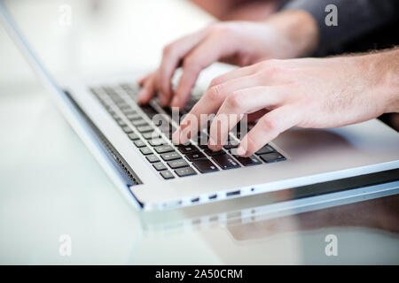 Work on a laptop - as always, the programmer pretends to work Stock Photo