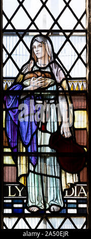 Stained glass window of Lydia, Seend church, Wiltshire, England, UK  1937 Joseph Bell Stock Photo