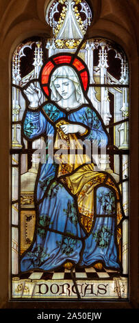 Stained glass window of Dorcas, Seend church, Wiltshire, England, 1905 UK  James Powell and Sons Stock Photo