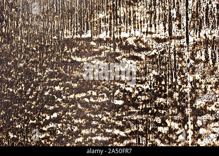 Textured wall,  paint or plaster white drops on black wall surface close up detail, grunge horizontal shabby background Stock Photo