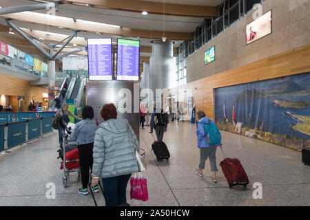 Cork Airport ,Ireland - September 25, 2019: Passengers walking through the departures check-in area of Cork airport Stock Photo