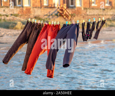 Washing drying on a clothes line Stock Photo