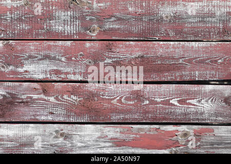 red-gray wooden background. horizontal boards. old paint peels off. old boards. Red gray wood texture of a worn painted board. Red gray wood texture Stock Photo