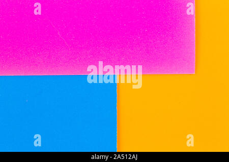 Picture in the form of a set of multi-colored squares and rectangles with natural paper. Stock Photo