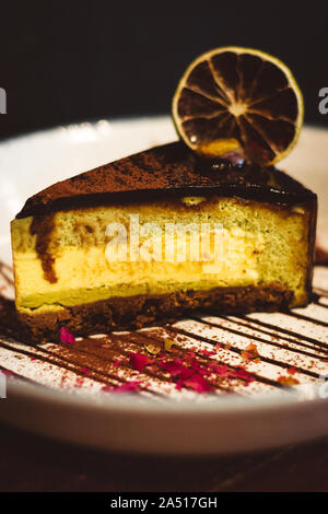 Pistachio & Yuzu Feuilletine Cake A springtime delight; light and zesty cake that refreshes the palate Stock Photo