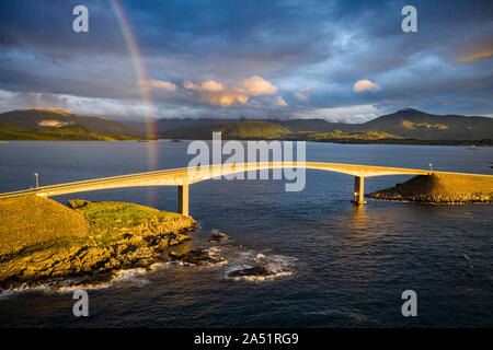 Aerial view of rainbow over Storseisundet Bridge at sunset, Atlantic Road, More og Romsdal county, Norway