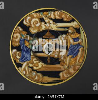 Plate with the Arms of the Pucci Family, 1532. This plate comes from a large service produced for a member of the Pucci family, prominent Florentine art patrons and ancestors of 20th-century fashion designer Emilio Pucci. Highly decorated maiolica plates such as this were displayed for commemorative purposes and to emphasize the wealth of the family through the prominence of their coat of arms. Stock Photo